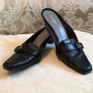Black mules with pewter buckles